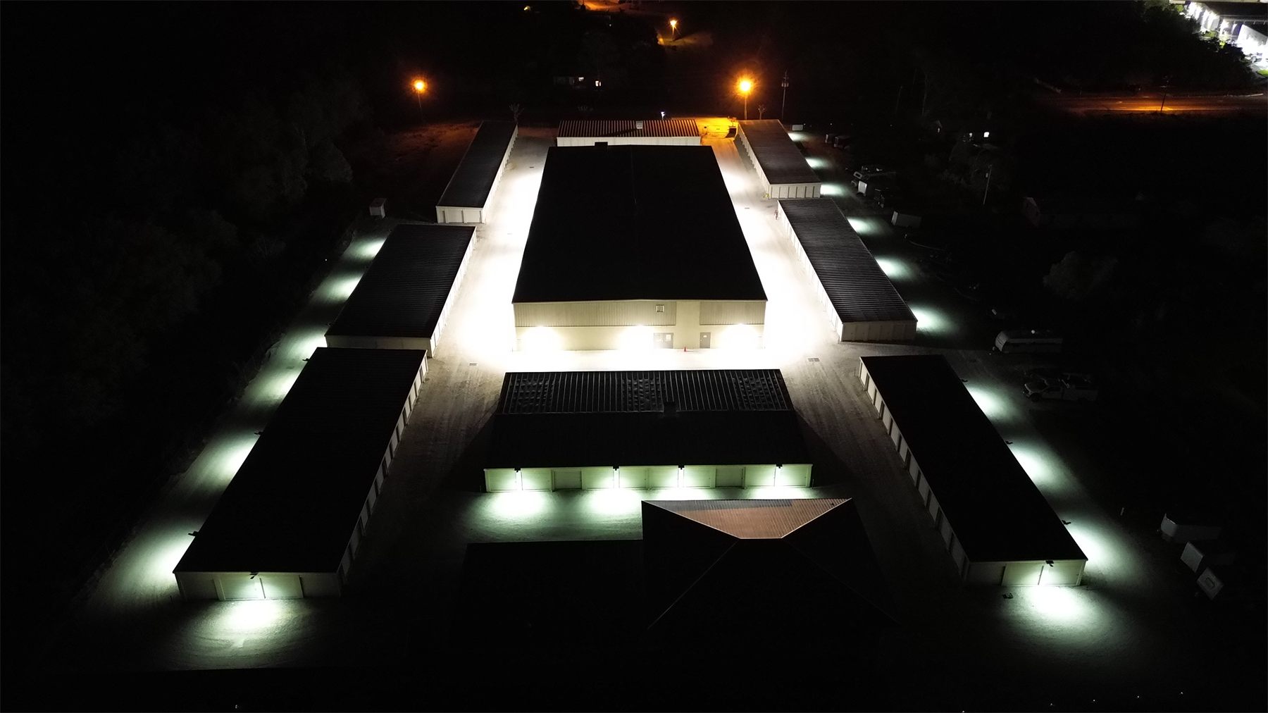 Aerial view of the AAA American Storage facility at night